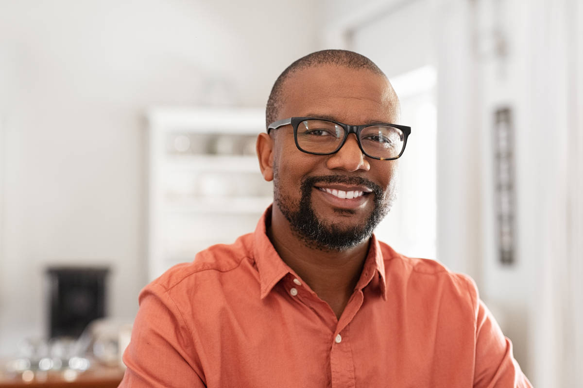 african mature man with spectacles